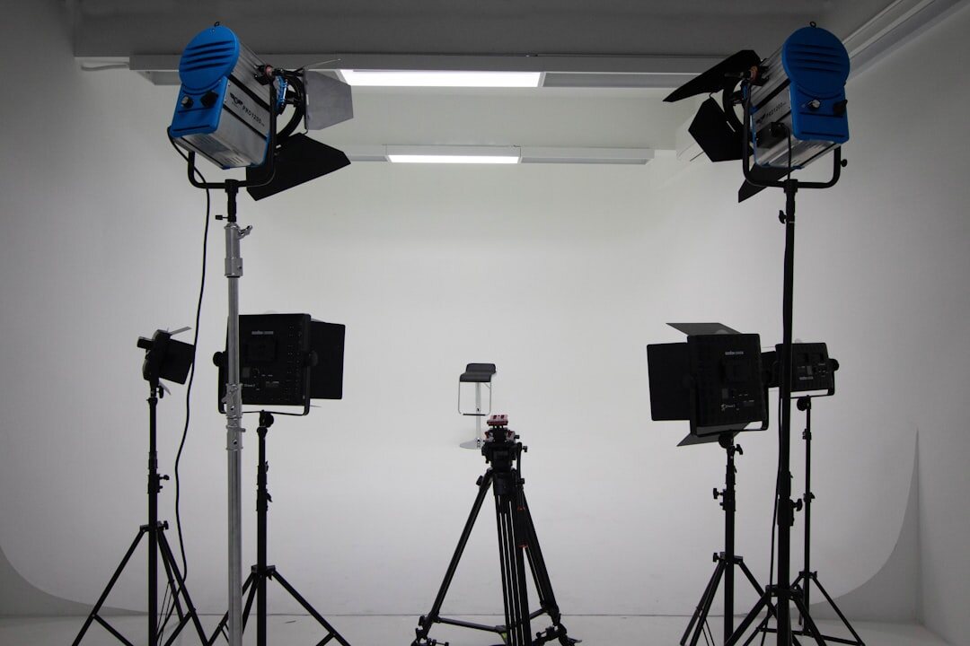 Professional broadcast studio with multiple cameras and lighting rigs