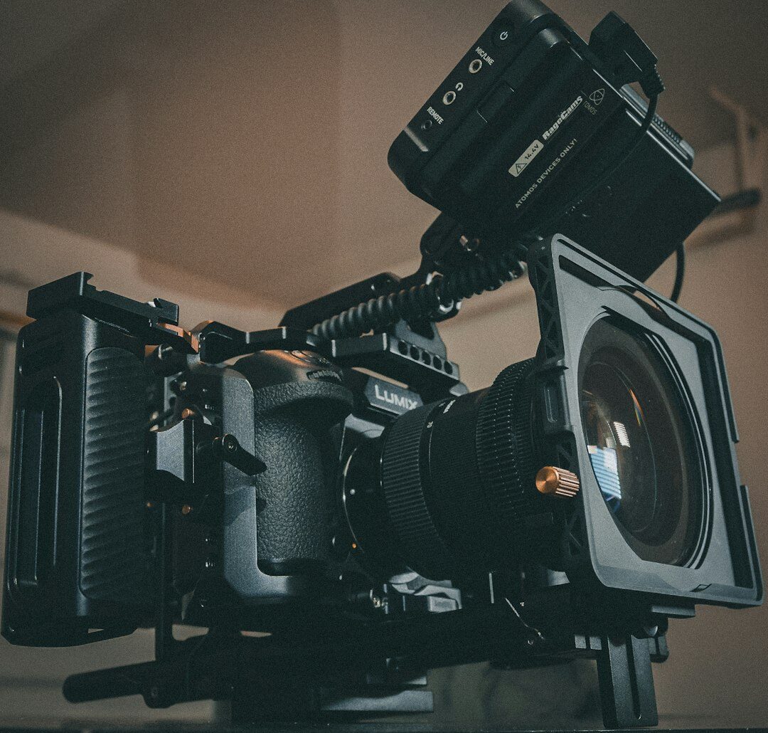 Cinematographer operating professional cinema camera on set